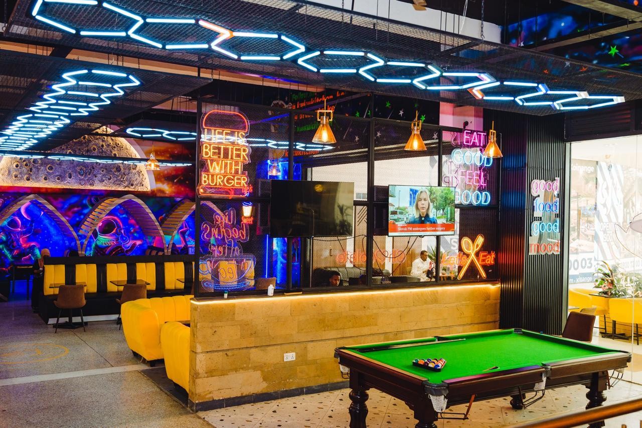 Kuku Kitchen — Custom booth seating area