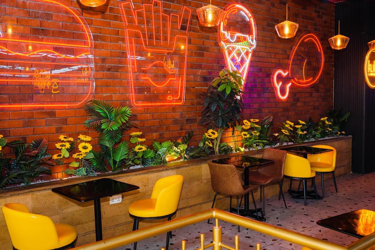 Kuku Kitchen — Exposed brick wall features